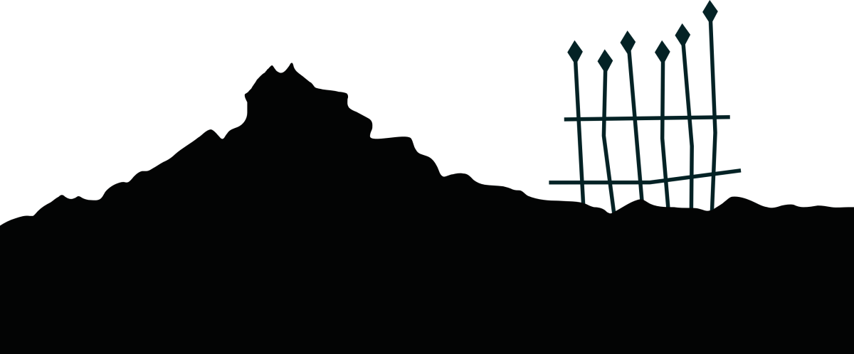 Schwarze Felsenlandschaft mit einem einzelnen Eisengitter